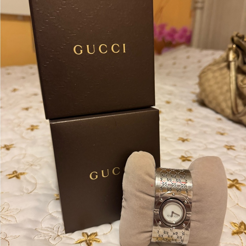 Genuine Gucci bracelet watch.